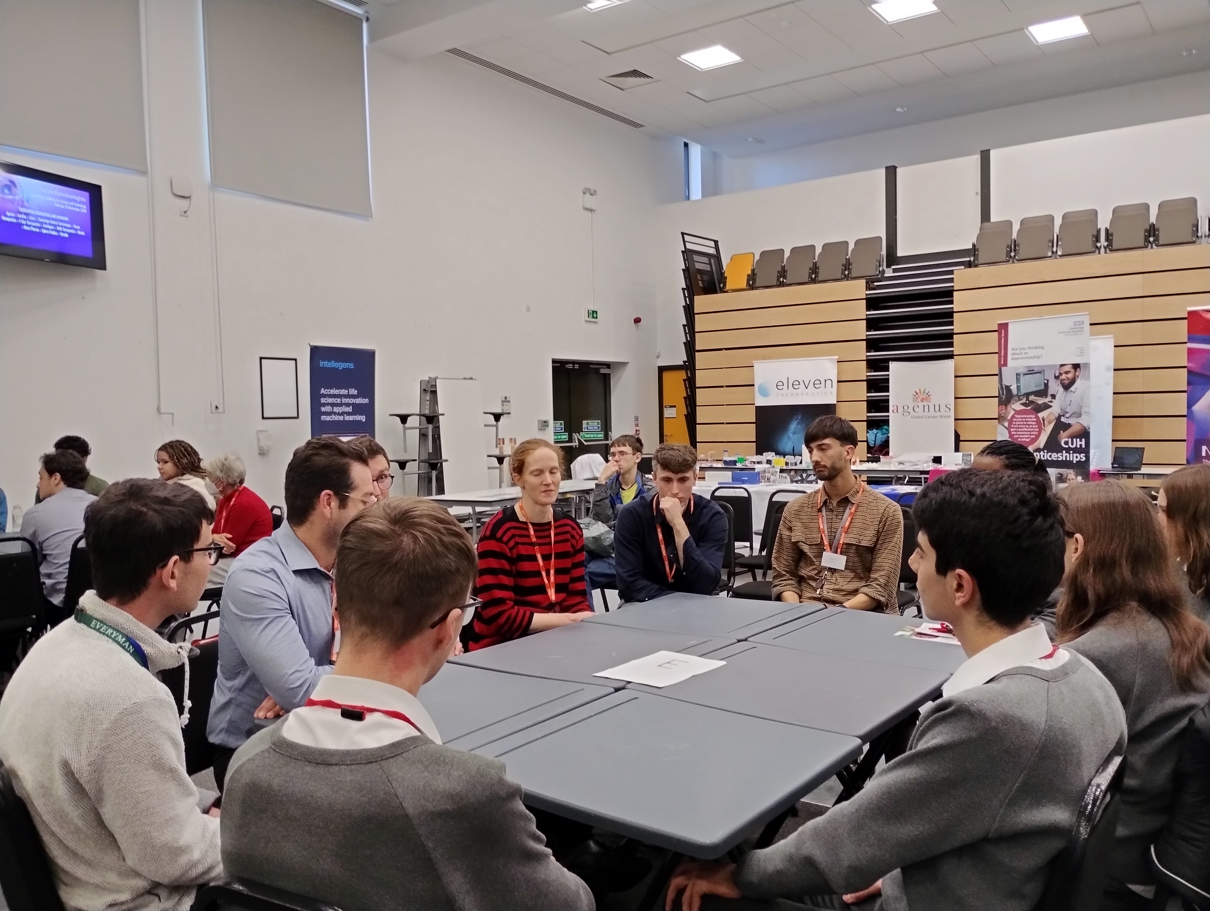 Volunteers talking to the students during the carousel session