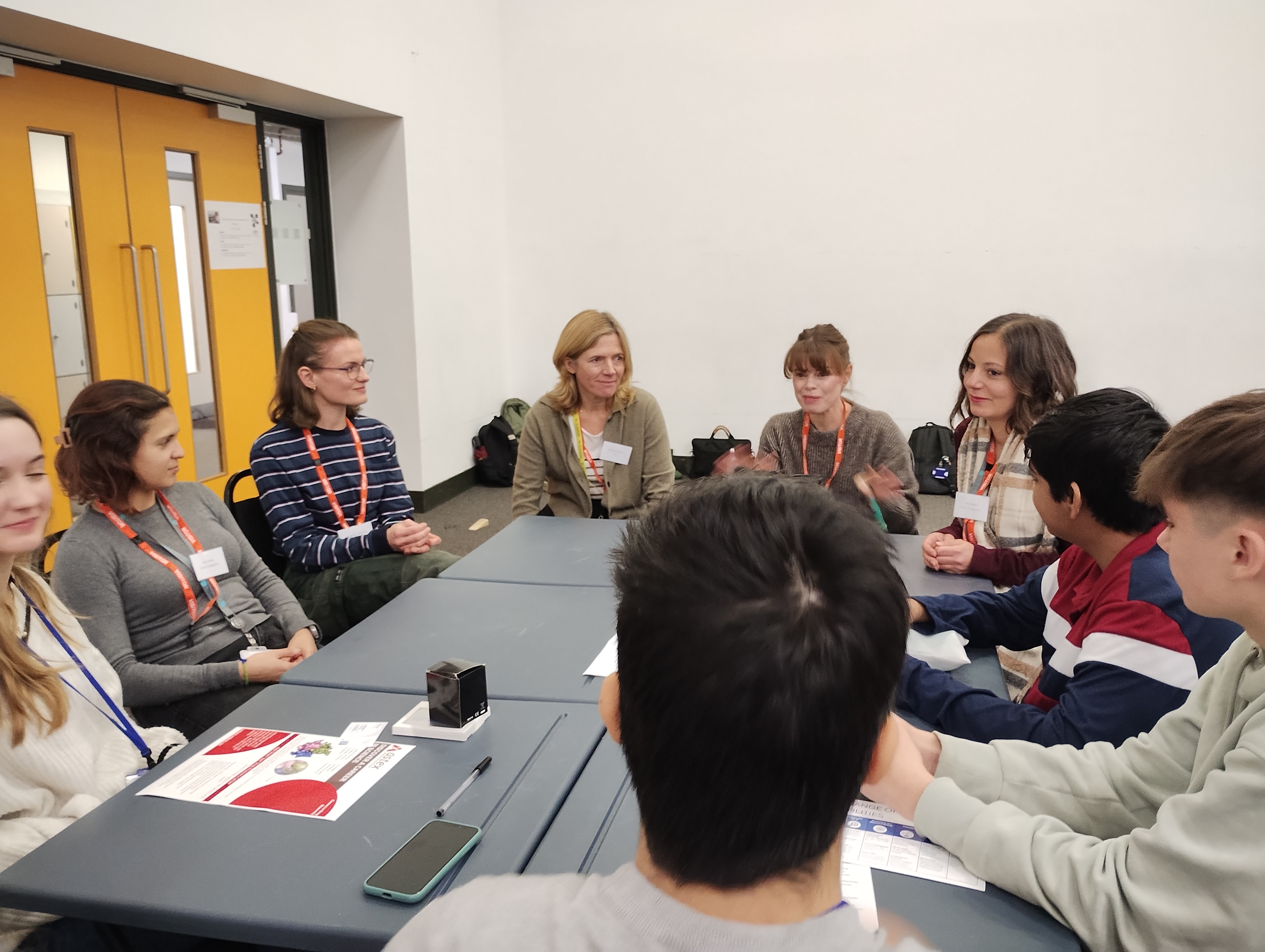 Volunteers talking to the students during the carousel session